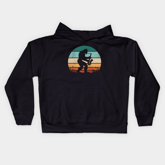 Vintage Bigfoot Playing the Saxophone Retro Sunset Music Lover Kids Hoodie by Cuteness Klub